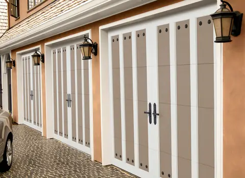 Carriage Court Arcadia garage door in Sandtone on a home