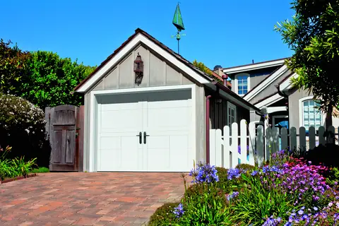 Carriage Court Fairfield garage door in True White on a home