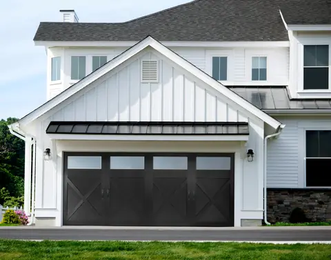 Carriage Court Rosemont garage door in Black / Black on a home