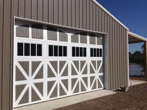 Classica Santiago garage door in True White / Terratone on a home