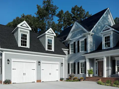 Classica Cortona garage door in True White on a home