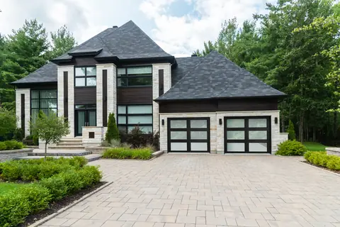 Classica Full View garage door in Black on a home