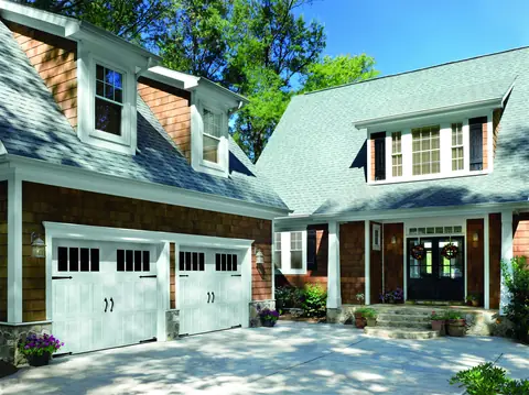 Classica Northampton garage door in True White on a home
