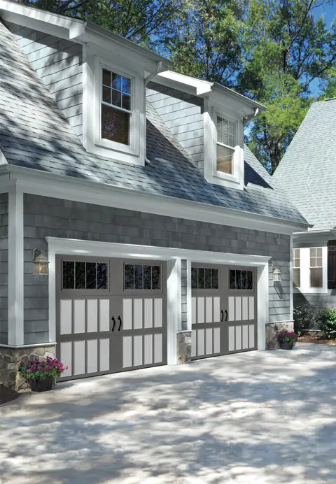 Classica Northampton garage door in Charcoal Gray / Gray on a home