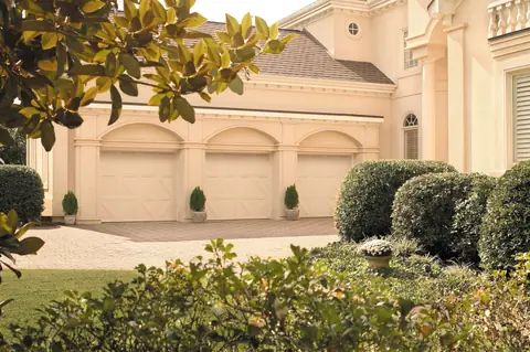 Classica Valencia garage door in Custom Paint on a home
