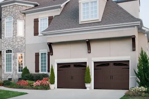Designers Choice Long Bead Board garage door in Dark Brown on a home
