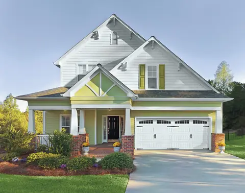 Designers Choice Long Bead Board garage door in True White on a home