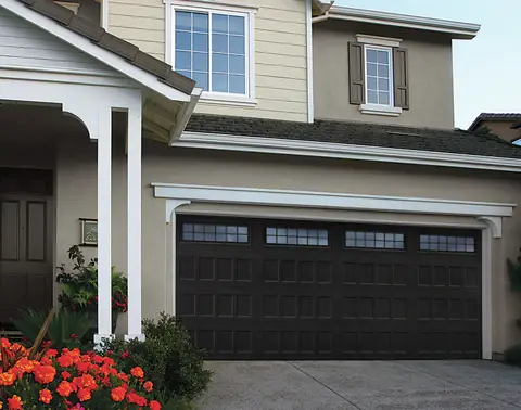 Designers Choice Recessed garage door in Black on a home