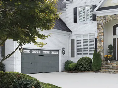 Designers Choice Recessed garage door in Charcoal Gray on a home