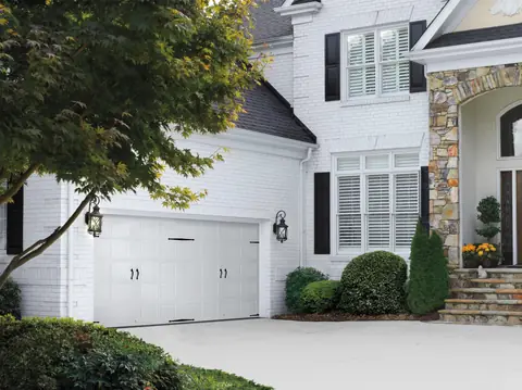 Hillcrest Bead Board garage door in True White on a home