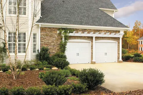 Hillcrest Bead Board garage door in True White on a home