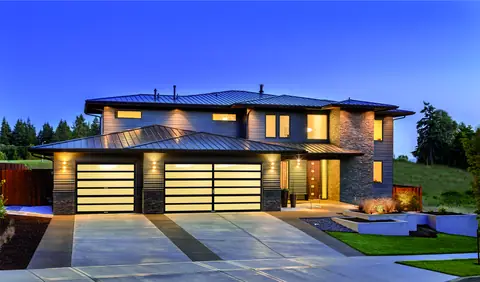 Horizon MultiView garage door in Dark Bronze Anodize on a home