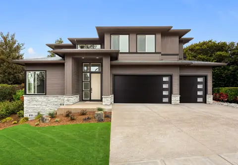Lincoln Flush garage door in Black on a home