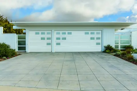 Lincoln Flush garage door in True White on a home