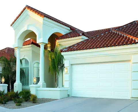 Lincoln Long garage door in True White on a home