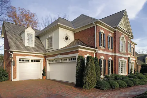 Lincoln Long garage door in True White on a home