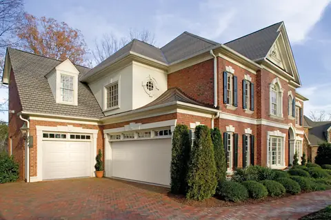 Lincoln Long garage door in True White on a home