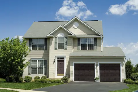 Lincoln Short garage door in Mahogany on a home