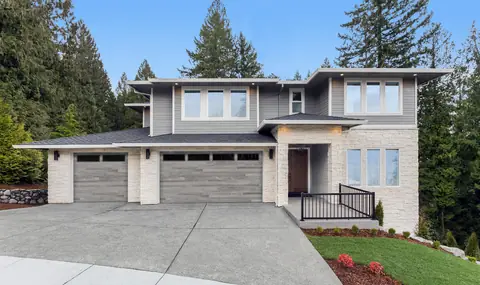 Northwoods garage door in Aspen Gray on a home