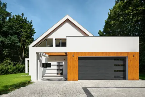 Northwoods garage door in Onyx on a home