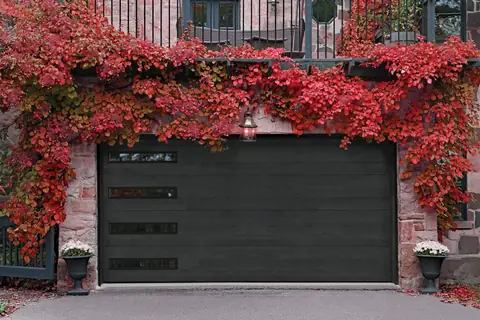 Northwoods garage door in Onyx on a home