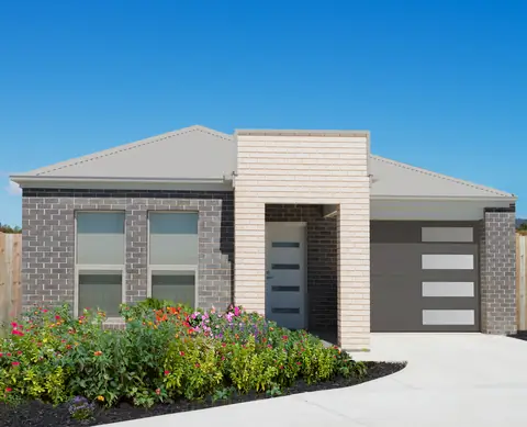 Olympus Flush garage door in Charcoal Gray Mosaic on a home