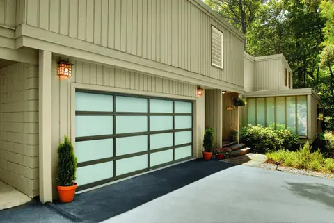 Vista Full View garage door in Medium Bronze Anodize on a home